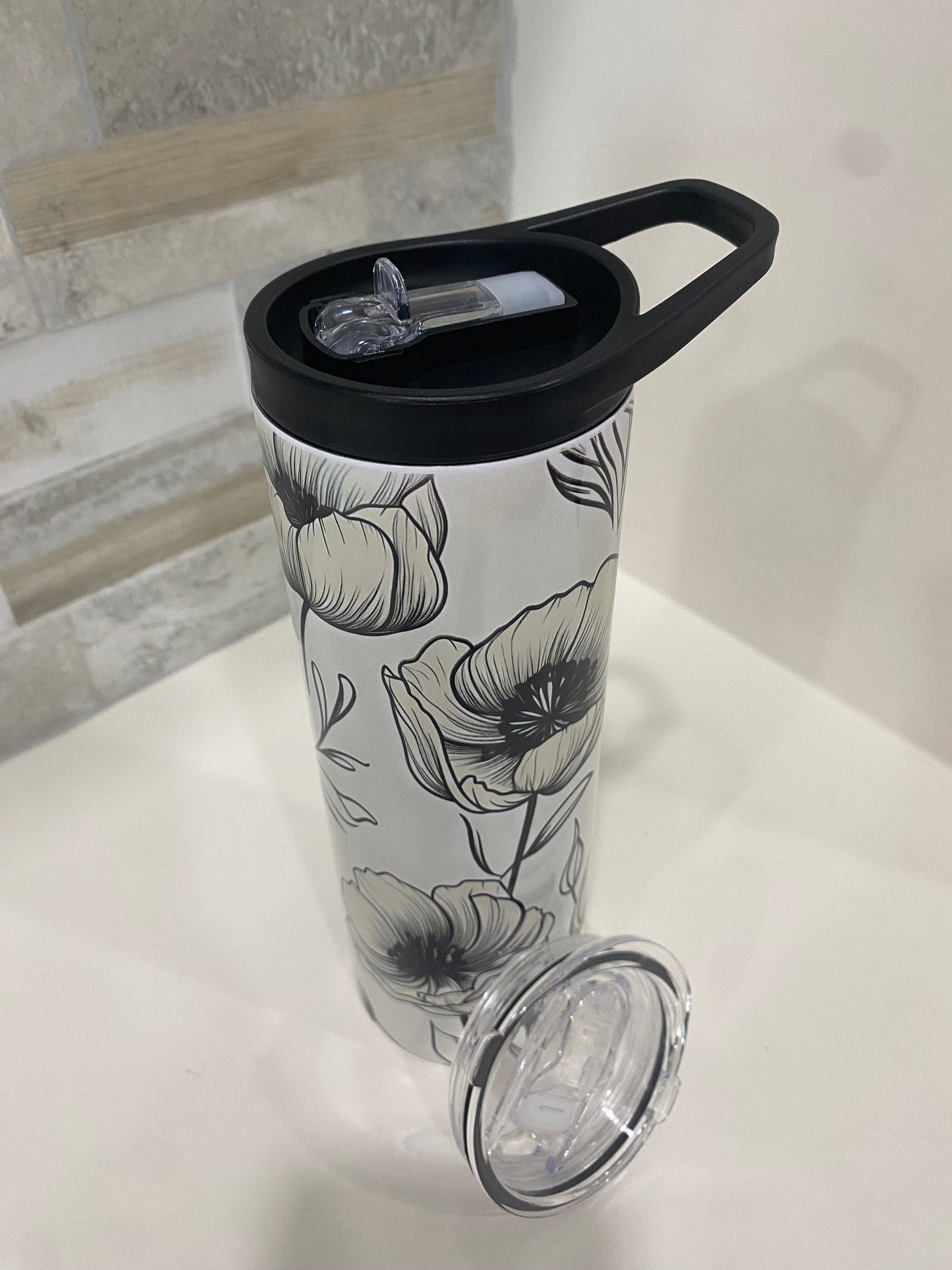 White and black water bottle and tumbler. 20 oz tumbler. Flower tumbler.