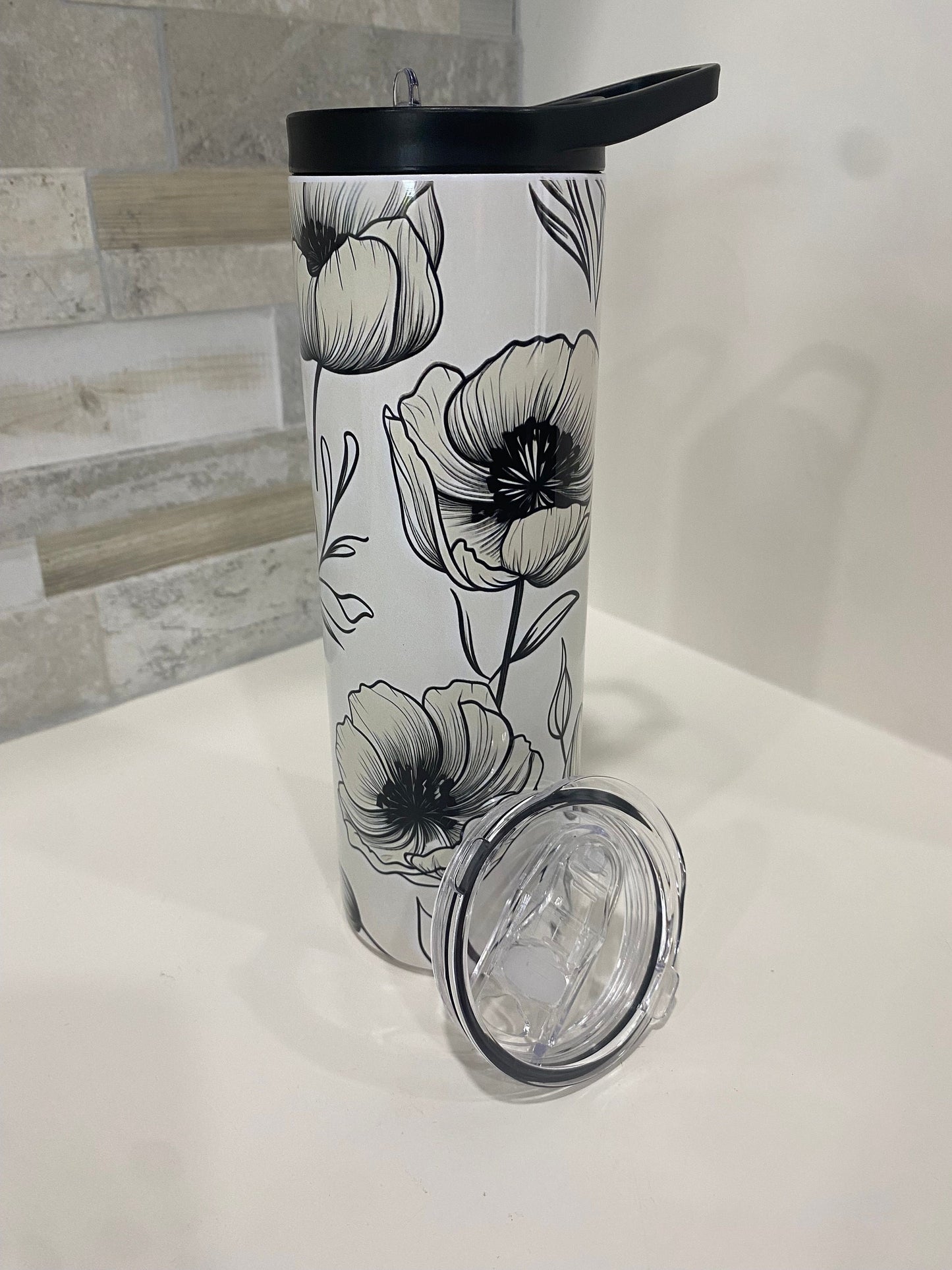 White and black water bottle and tumbler. 20 oz tumbler. Flower tumbler.