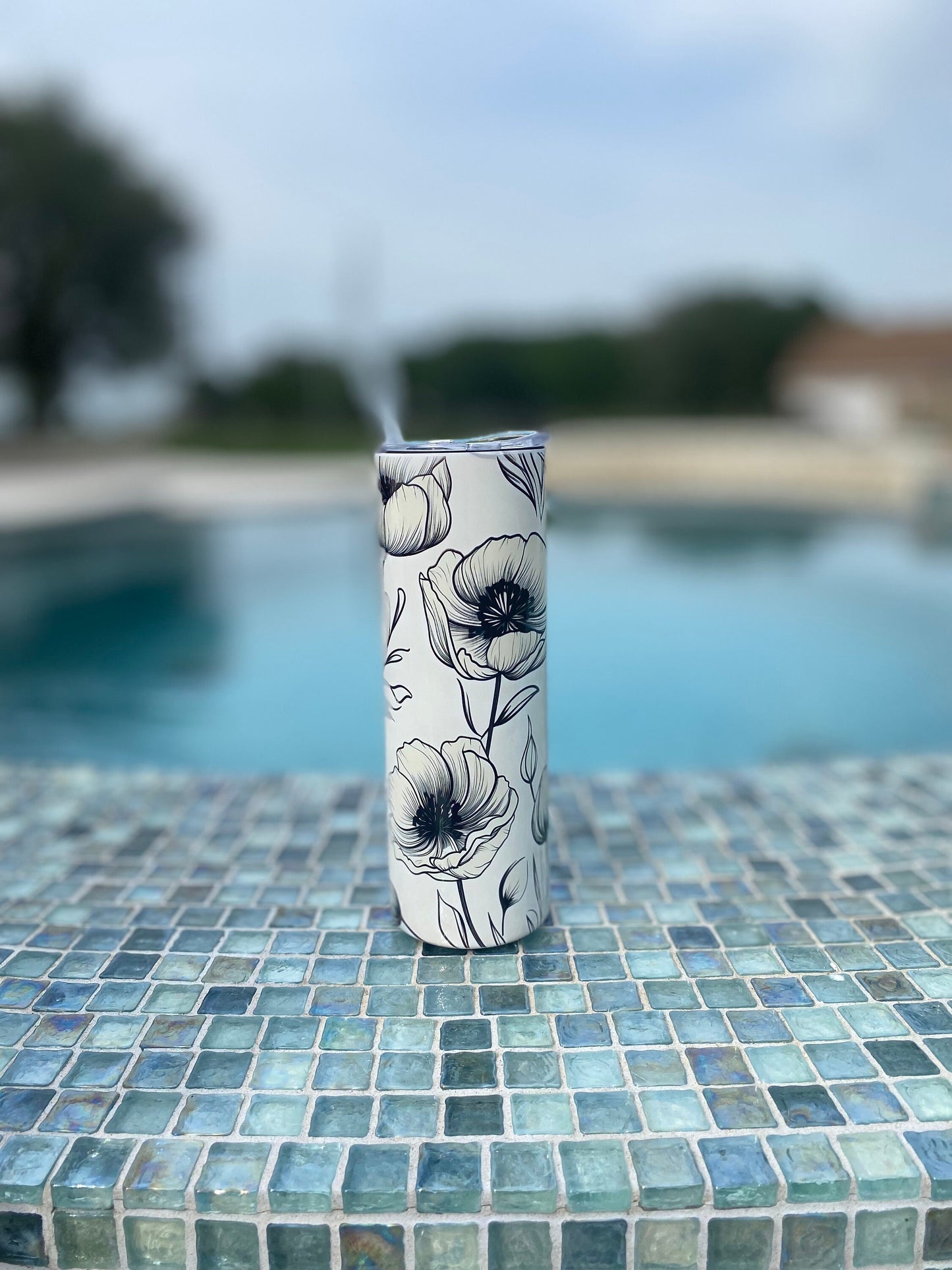 White and black water bottle and tumbler. 20 oz tumbler. Flower tumbler.